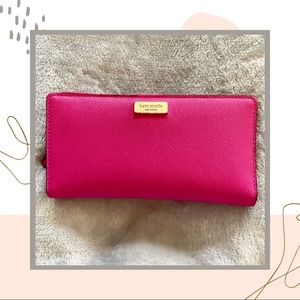 Kate Spade bifold wallet in fuscia